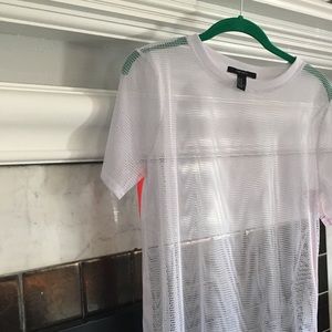 White mesh top with neon orange accent color